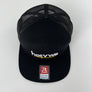 A black trucker-style snapback cap with a flat brim, black mesh back panels, and white embroidered text reading 'hotwwe' on the front. A red and white retail sticker is attached to the brim.