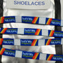 Shoelaces with a repeating 'hotVWs magazine' logo pattern in blue, white, and red, displayed inside a clear plastic bag with a white paper insert labeled 'hotVWs SHOELACES'.