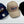 Three baseball caps displayed side by side on a light gray background: a navy blue cap, a beige cap, and a black cap. Each cap features an embroidered oval logo reading 'hotVWs magazine' in white, red, and yellow.