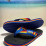 Colorful sandal with Hot VWs logo on a beach background.