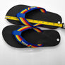 Black flip-flops with colorful strap and measuring tape on a white background