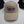 A beige baseball cap with an embroidered oval logo reading 'hotVWs magazine' in blue and red, displayed on a white surface with two other branded caps partially visible in the background.