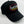 A black baseball cap with an embroidered oval logo on the front panel. The logo features the words 'Hot Magazine' in white and yellow, outlined in red.
