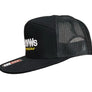 A black trucker hat with a flat brim and black mesh back, held by a hand against a black background. The front panel features white embroidered text reading 'Hot VWs' and yellow script text reading 'magazine'.